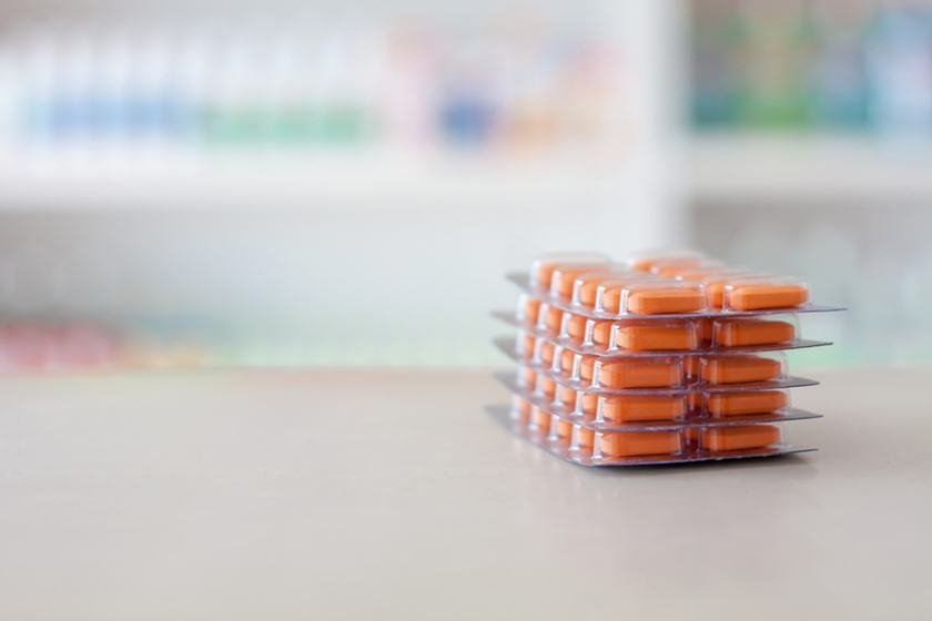pills in package on pharmacy counter