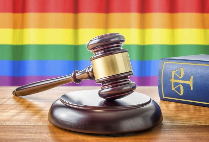 Gavel and a law book – Rainbow flag
