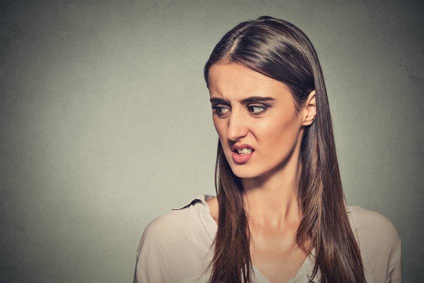 Disgusted displeased woman