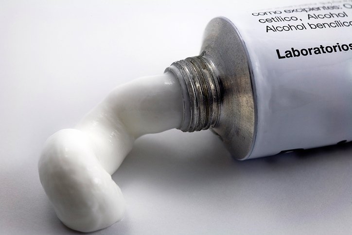 Tube with ointment isolated on a white background