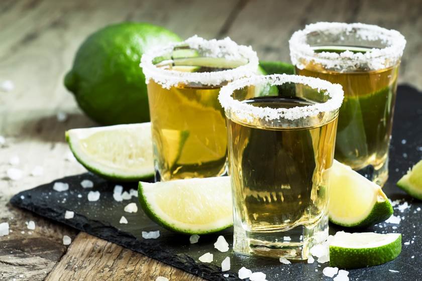 Gold Mexican tequila with lime and salt