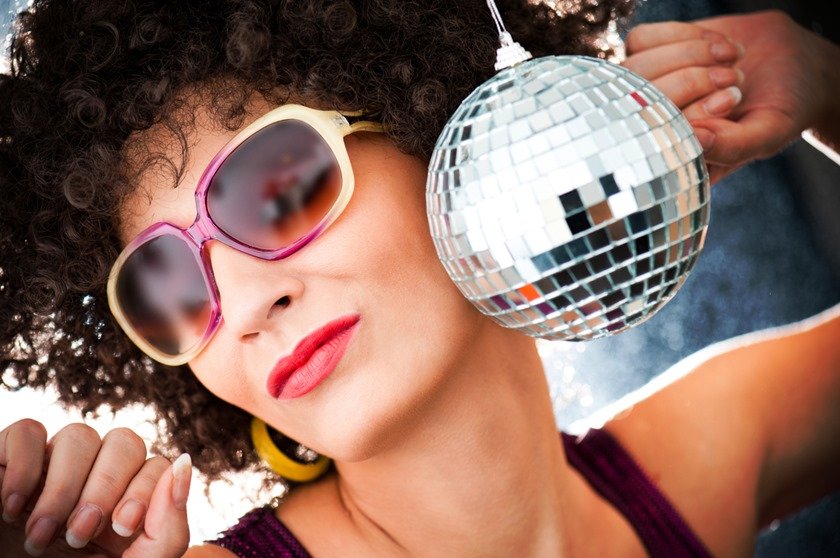 Disco ball with woman in sunglasses