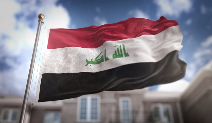 Iraq Flag 3D Rendering on Blue Sky Building Background