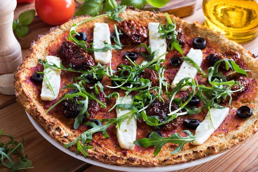 Gluten-free grain-free vegetarian pizza made from cauliflower and almond flour