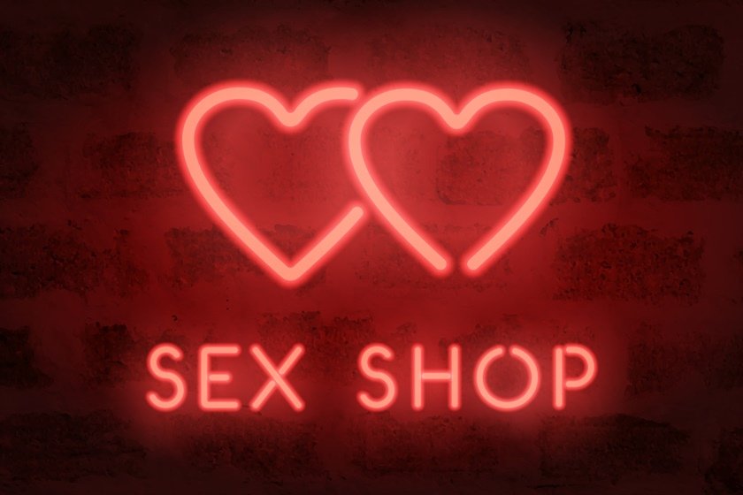 Neon sex shop vector sign. Red glowing hearts