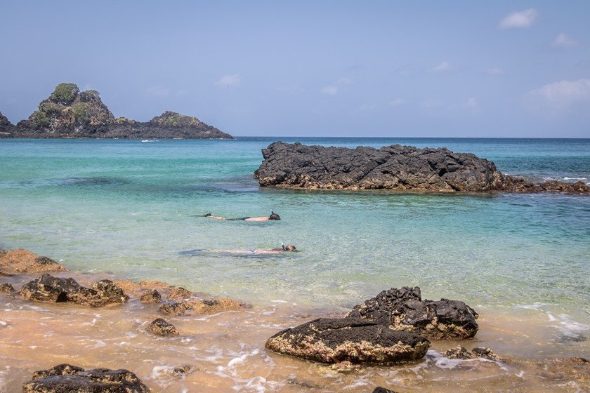 People Snorkeling at Praia do Sancho Beach - Fernando de Noronha, Pernambuco, Brazil