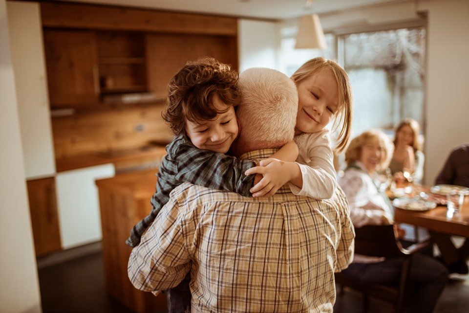 Grandfather playing with his grandkids