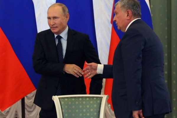 Russian President Vladimir Putin and Igor Sechin
