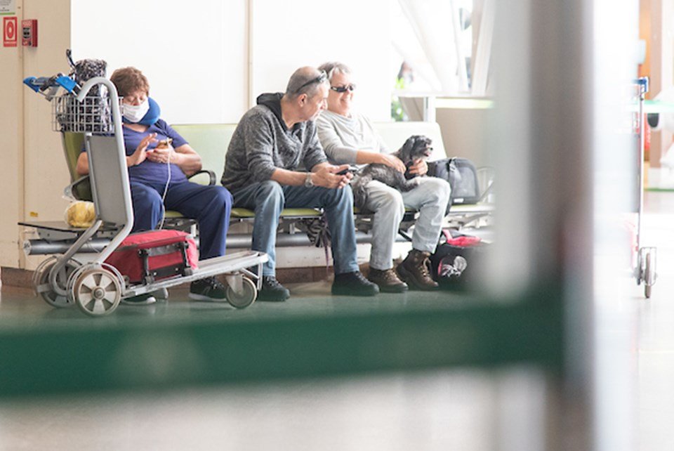 Passageiros no Aeroporto JK