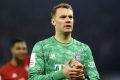 Manuel Neuer com a camisa verde de goleiro do Bayern