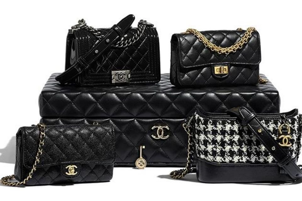 Box com 4 mini bolsas da chanel