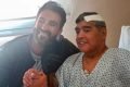 Maradona com curativo na cabeça