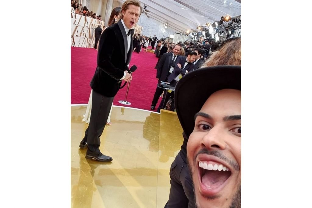 Hugo Gloss com Brad Pitt