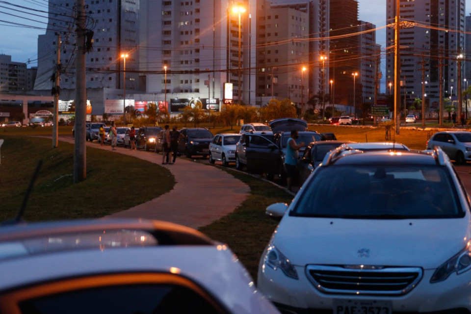 fila de carros
