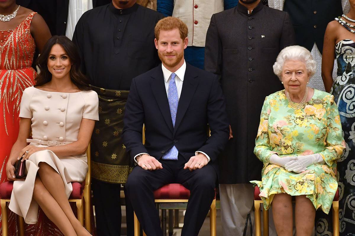 Meghan Markle, príncipe Harry e rainha Elizabeth II