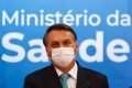 Presidente Jair Bolsonaro e o Ministro Marcelo Queiroga durante evento de Assinatura do contrato de transferência de tecnologia da AstraZeneca para a Fundação Oswaldo Cruz (Fiocruz) em Brasília.