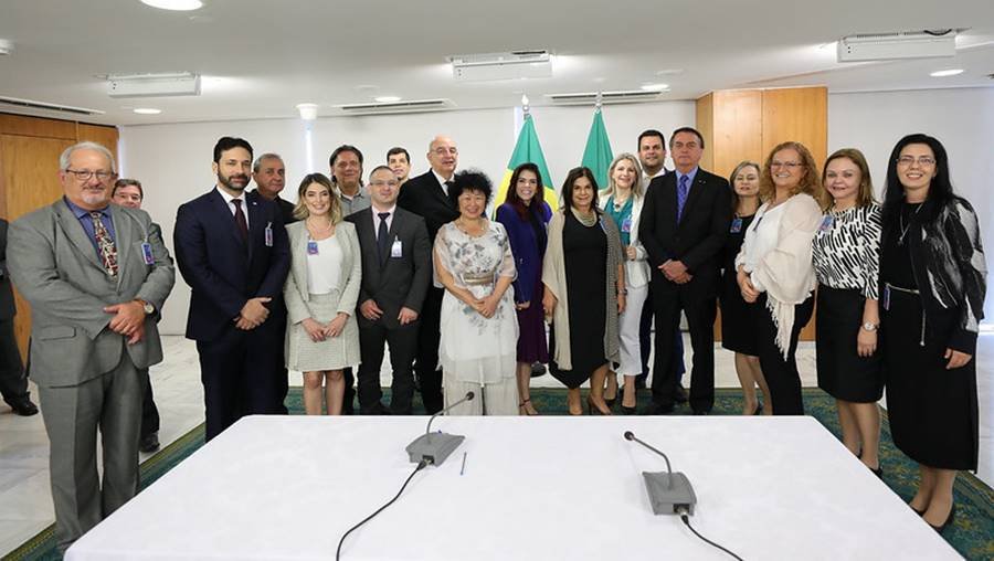 O presidente Jair Bolsonaro reunido com o suposto