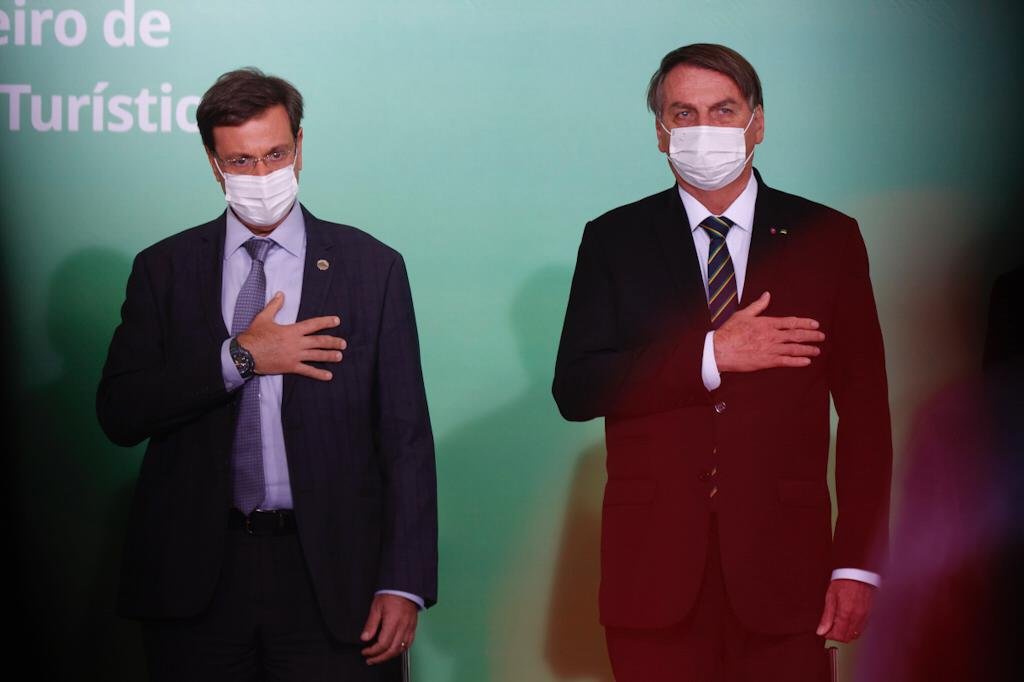 O ministro do Turismo, Gilson Machado Neto, ao lado do presidente Jair Bolsonaro , durante apresentação das ações para desburocratização e atração de investimentos para setor de turismo 2