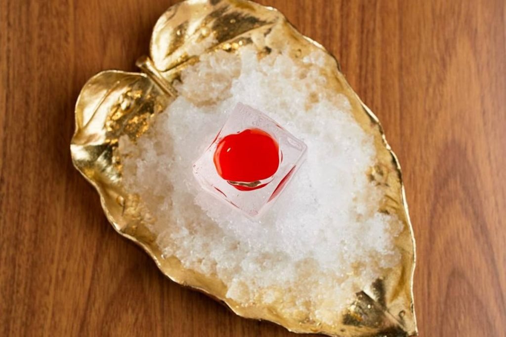 Concha com gelo e água de morango
