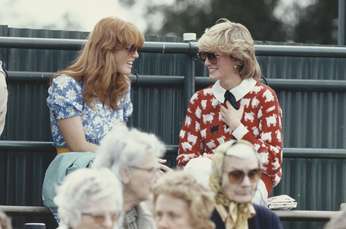 Diana, Princess of Wales (1961 - 1997) with Sarah Ferguson at the Guard's Polo Club, Windsor, June 1983. The Princess is wearing a jumper with a sheep motif from the London shop, Warm And Wonderful. (Photo by Georges De Keerle/Getty Images)