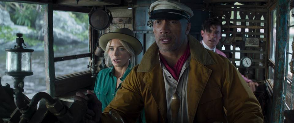 (L-R): Emily Blunt as Lily Houghton, Dwayne Johnson as Frank Wolff and Jack Whitehall as MacGregor Houghton in Disney’s JUNGLE CRUISE. Photo courtesy of Disney. © 2021 Disney Enterprises, Inc. All Rights Reserved.