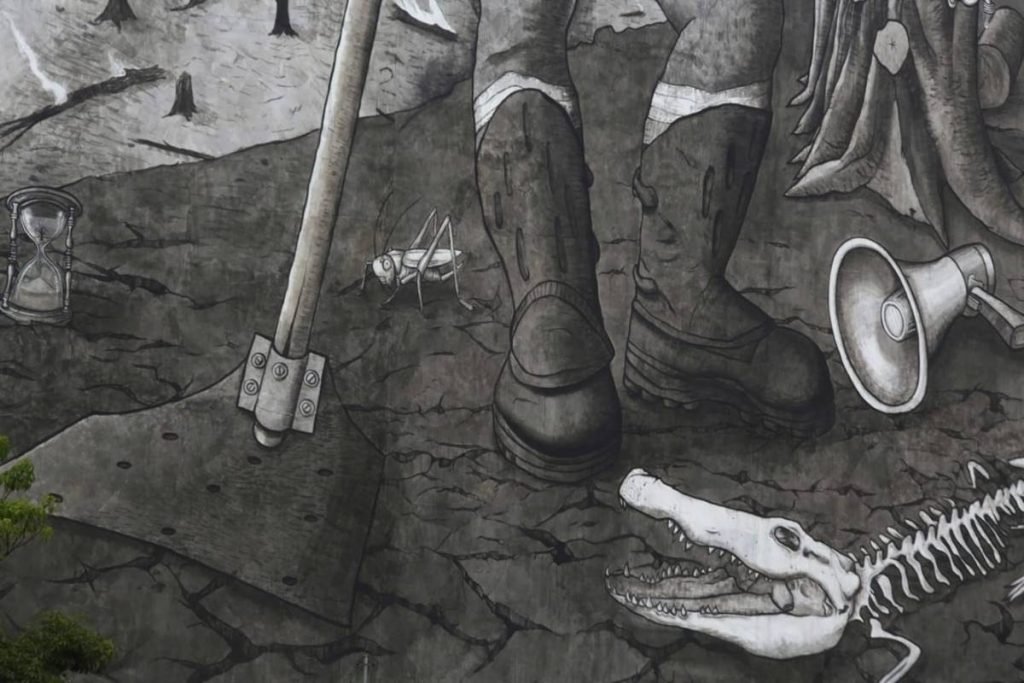 pintura feita com cinzas das queimadas homenageia brigadistas do Brasil em São Paulo