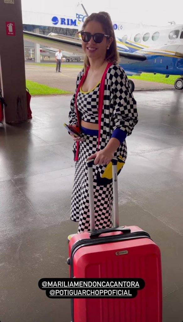 Marília Mendonça antes de embarcar