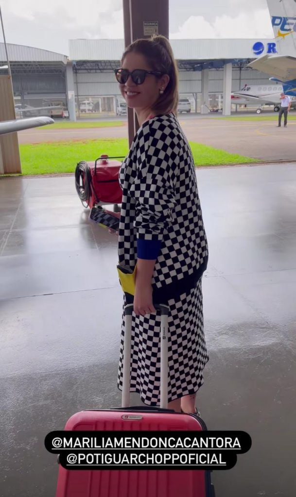Marília Mendonça antes de embarcar