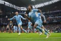 Sterling comemorando gol