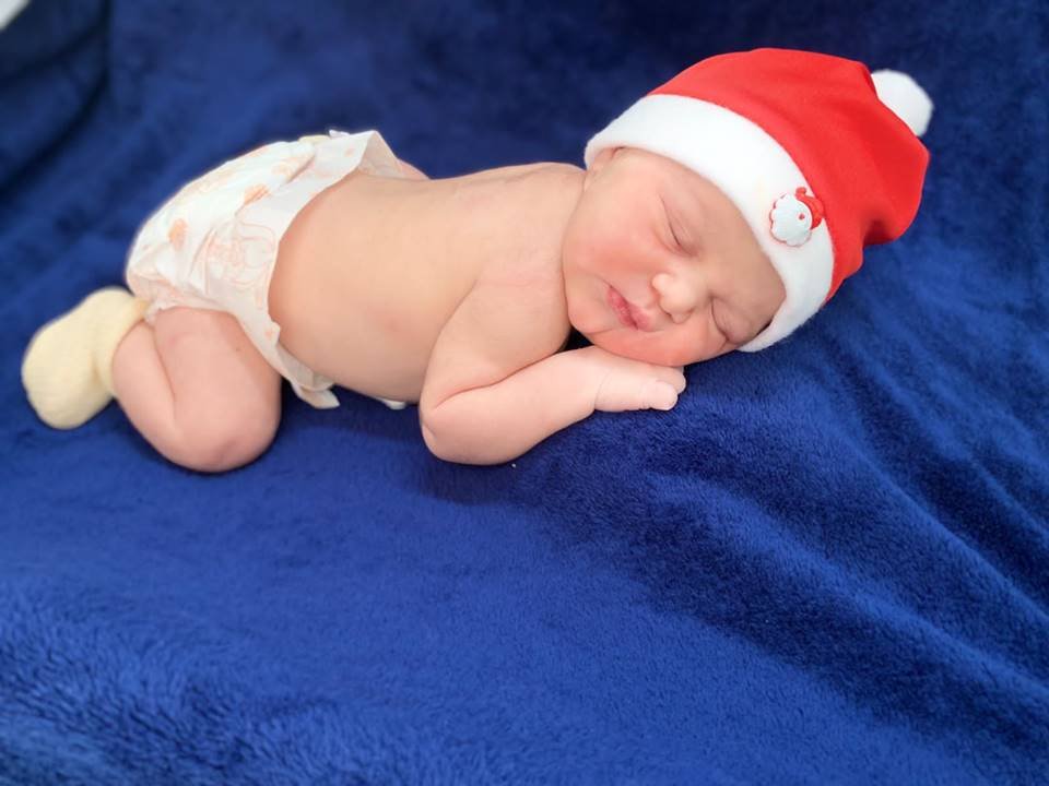 Bebê em ensaio fotográfico de Natal no HUB