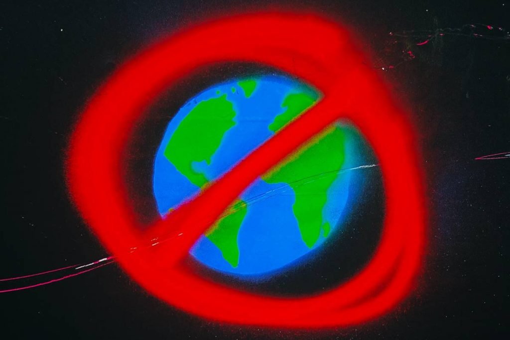 Desenho do planeta terra com símbolo de proibido vermelho