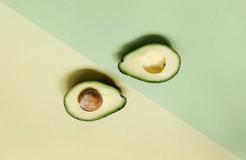 In the color image, the avocado is located in the center