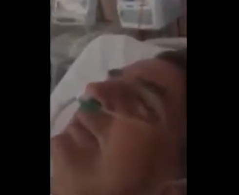 Bolsonaro posta vídeo em que aparece internado após sofrer atentado com faca nas eleições de 2018. Ele está numa cama, de olhos fechados, com sonda no nariz - Metrópl
