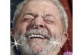 GIF de Lula rindo com filtro de brilho - Metrópoles