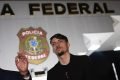 Jair Renan Bolsonaro chega andando a Superintendência da Polícia Federal acompanhando do seu advogado Frederick Wassef para prestar depoimento 11
