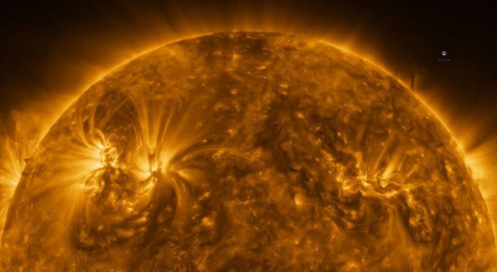 La enorme imagen del sol muestra la forma de un ser humano.