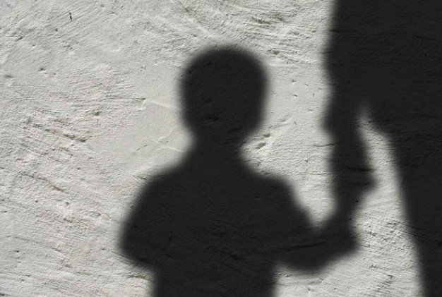 The shadow of a child holding someone's hand is Metropolis