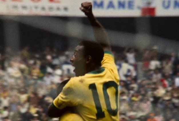 Pelé, former Brazilian soccer player.  He has black skin and dark hair - Metropolis