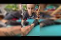 Menino de 7 anos tatuou mãe