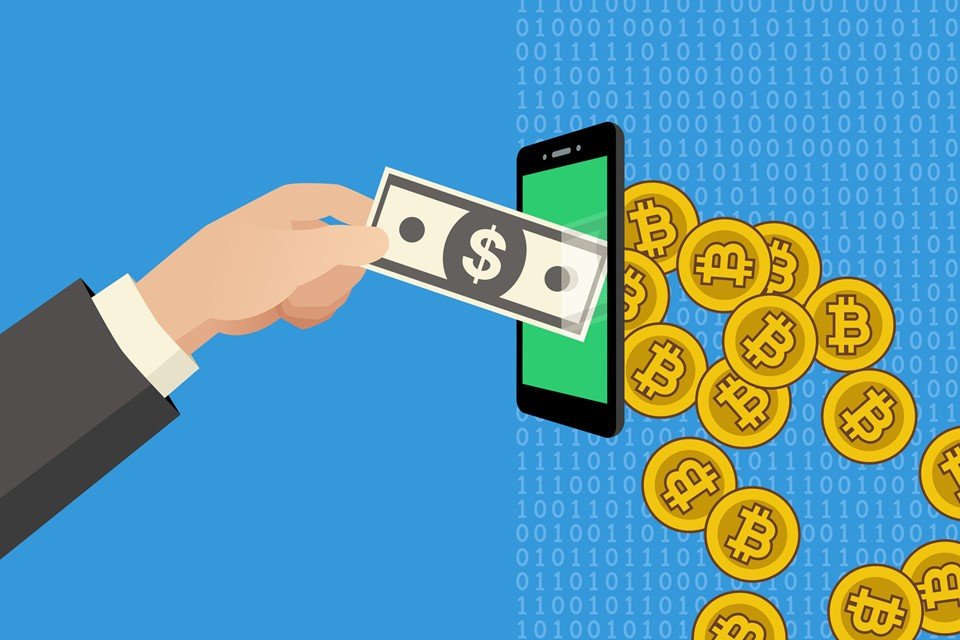 Ilustração de pessoa colocando cédula em celular de um lado e bitcoins saindo do aparelho de outro sob fundo azul - Metrópoles