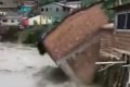 Casa cai em rio durante forte temporal na Grande Recife