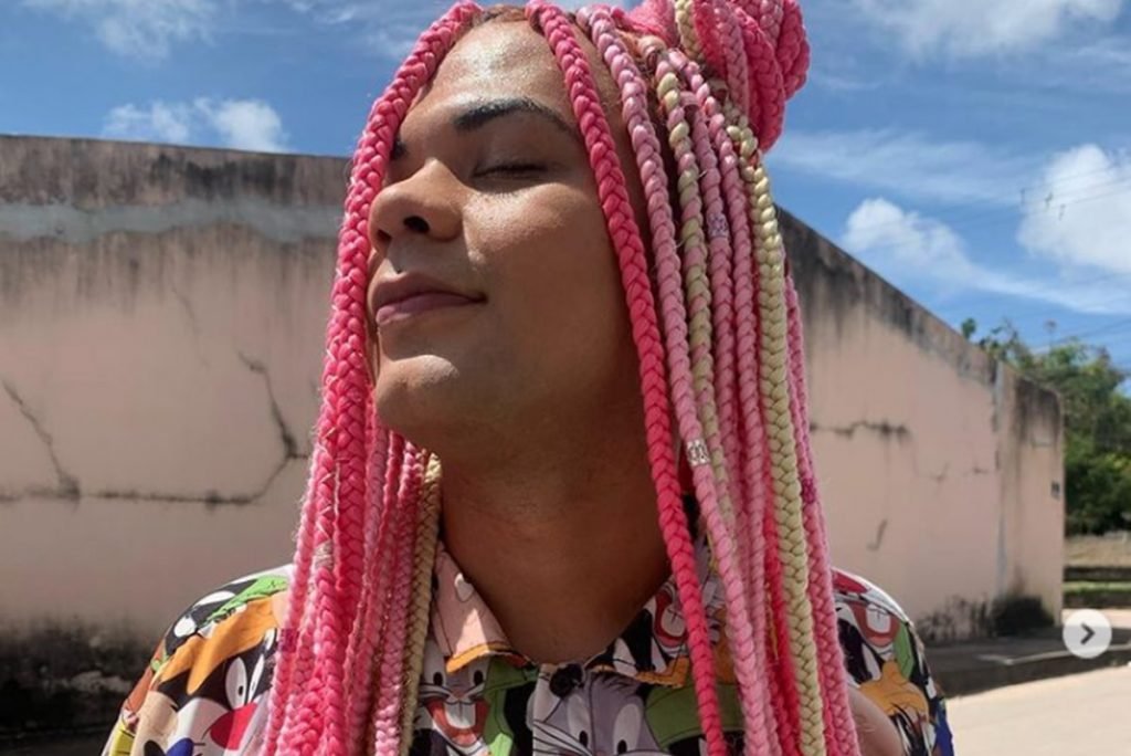 Arielly Germano, a trans woman, celebrates by braiding