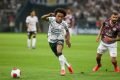 Imagem colorida de Willian jogando pelo Corinthians