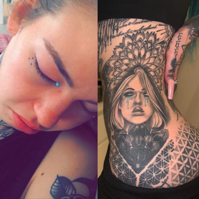 A modelo australiana Amber Luke, que produz conteúdo adulto no OnlyFans, uma mulher com mais de 200 tatuagens pelo corpo e os olhos pintados de azul, assim como o cabelo.