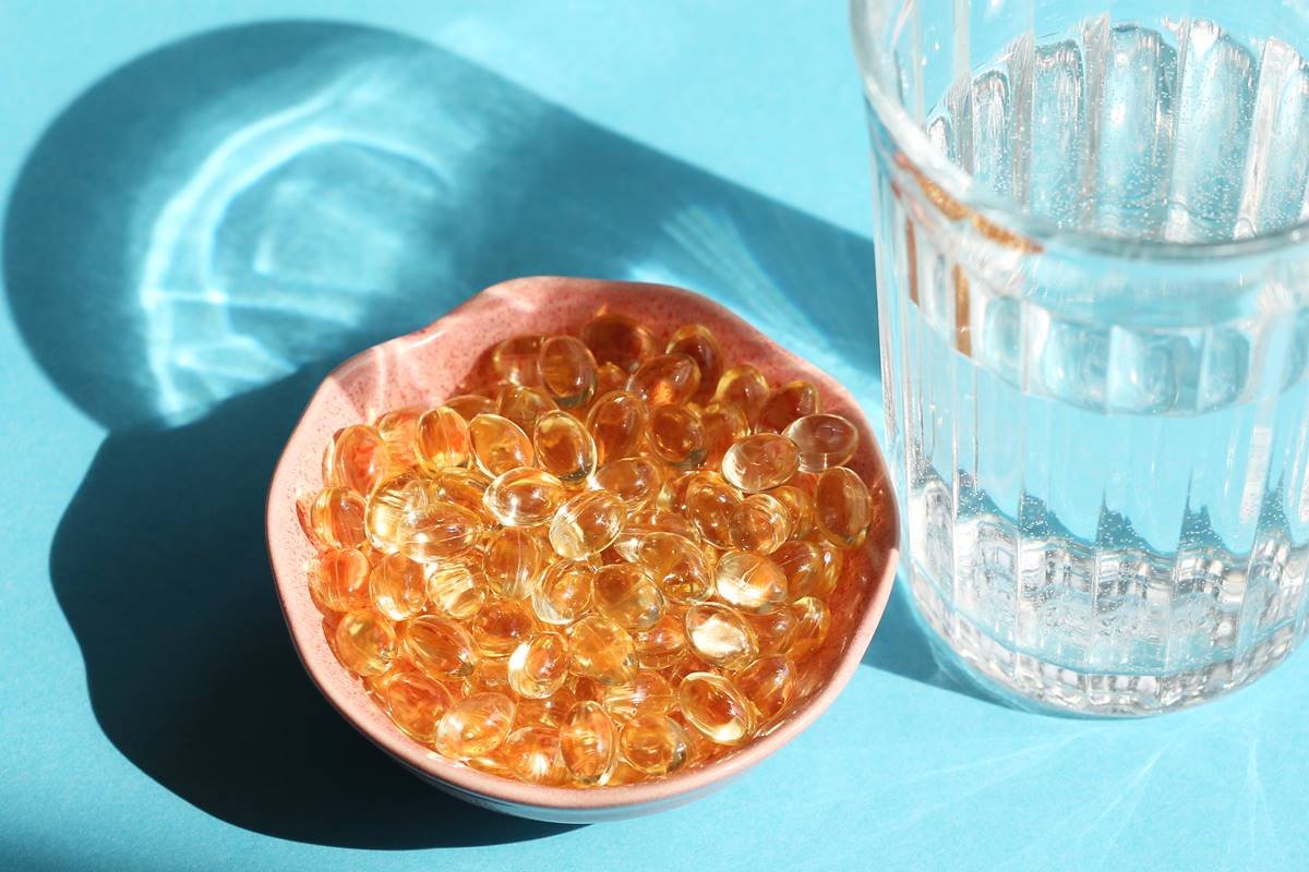 Foto de pílulas de vitamina D sob o sol