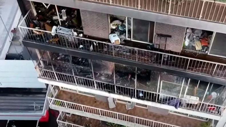 foto colorida de prédio após incêndio
