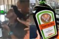 Homem bebe licor Jagermeister