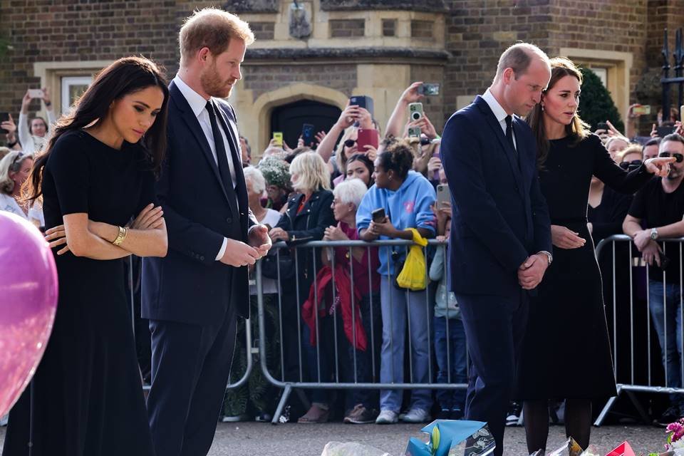 WINDSOR, ENGLAND - SEPTEMBER 10: Catherine, Princess of Wales, Prince William, Prince of Wales, Prince Harry, Duke of Sussex, and Meghan, Duchess of Sussex on the long Walk at Windsor Castle on September 10, 2022 in Windsor, England. Crowds have gathered and tributes left at the gates of Windsor Castle to Queen Elizabeth II, who died at Balmoral Castle on 8 September, 2022. (Photo by Chris Jackson - WPA Pool/Getty Images)