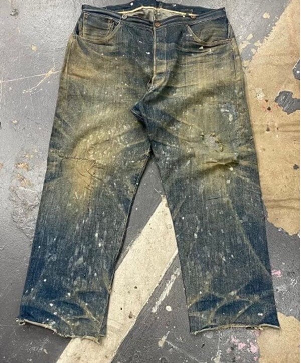 In the color image, Levi's pants with racist slogan are auctioned