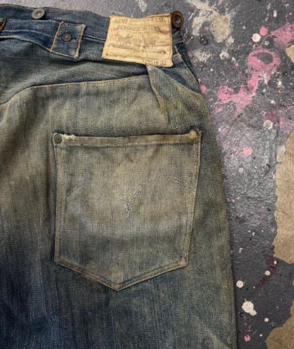 In the color image, Levi's pants with racist slogan are auctioned